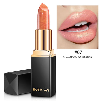 Black tube gold shiny lipstick